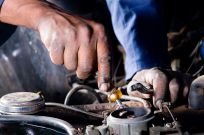 Mechanic working on car repairs in Auckland